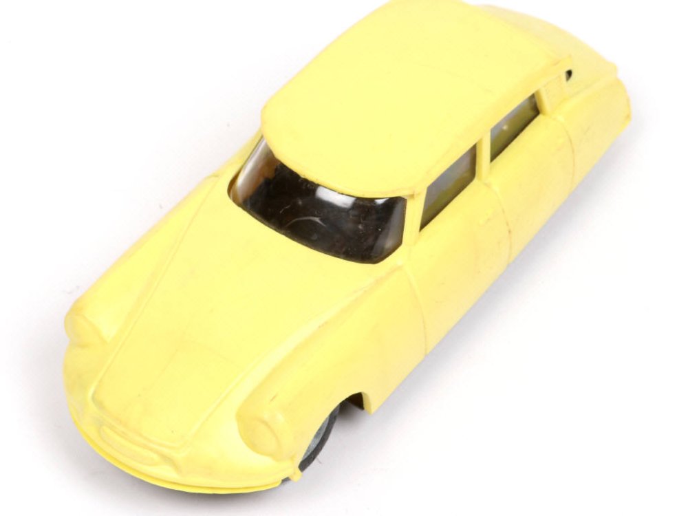 LEMEZARU (Hongrie) Citroën DS 19, long 16cm, moteur à friction avec bruiteur, en plastique et chassis tôle, jaune citron - Rare -.jpg